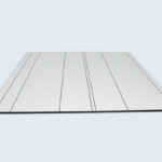 Plaque stratifié compact avec rainures de positionnement. Plaque stratifié compact avec rainures de positionnement.