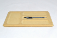 Pièce MDF pour plateau vide-poches, usinée dans la masse.